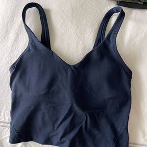 Lululemon women’s workout top in size 2. Never worn!
